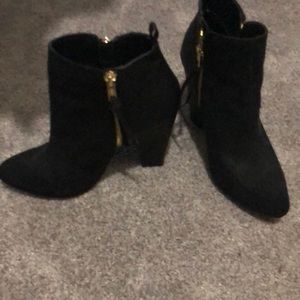 Black ankle booties, in brand new condition.